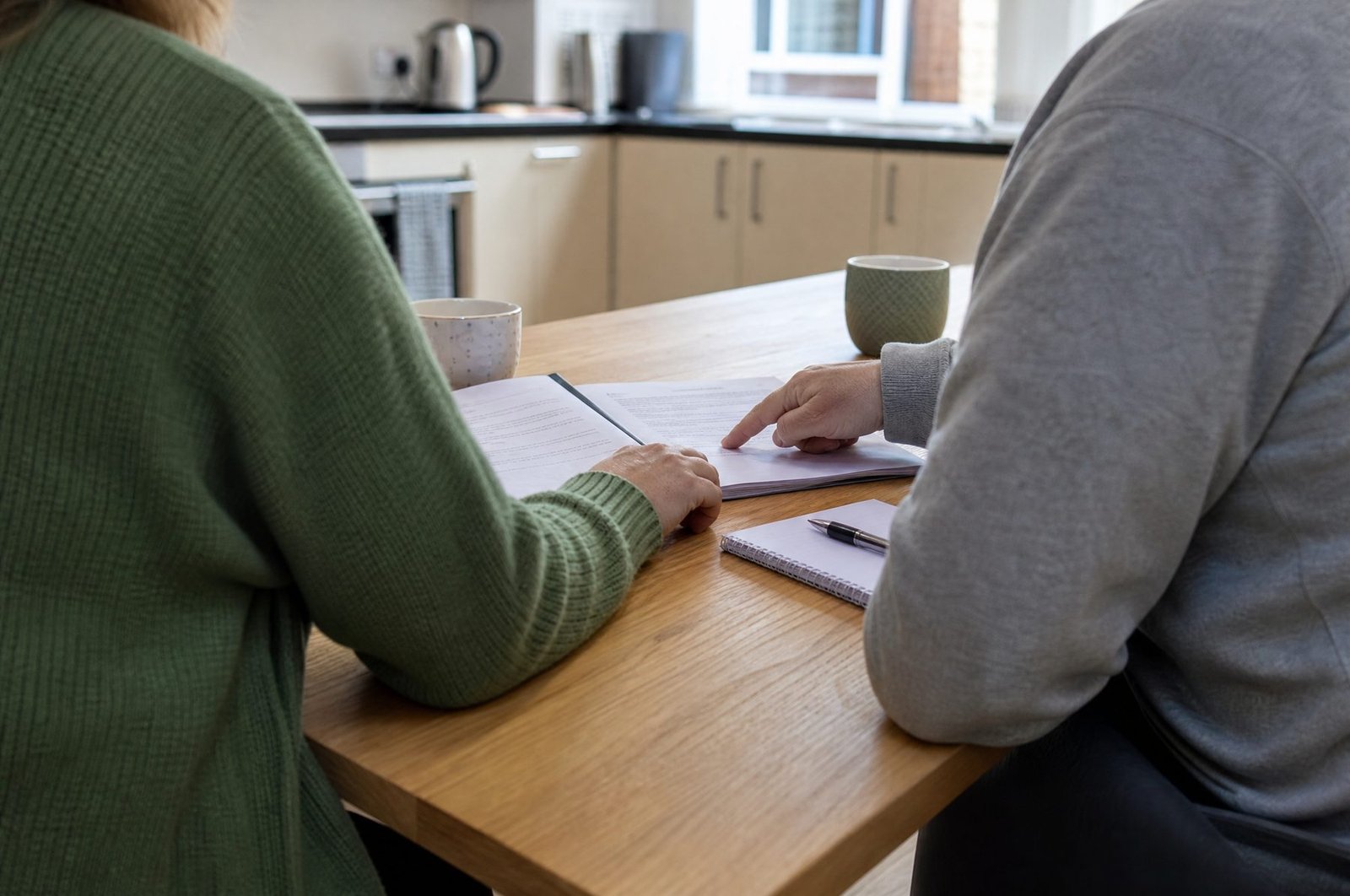 Key worker and resident going through a support plan together